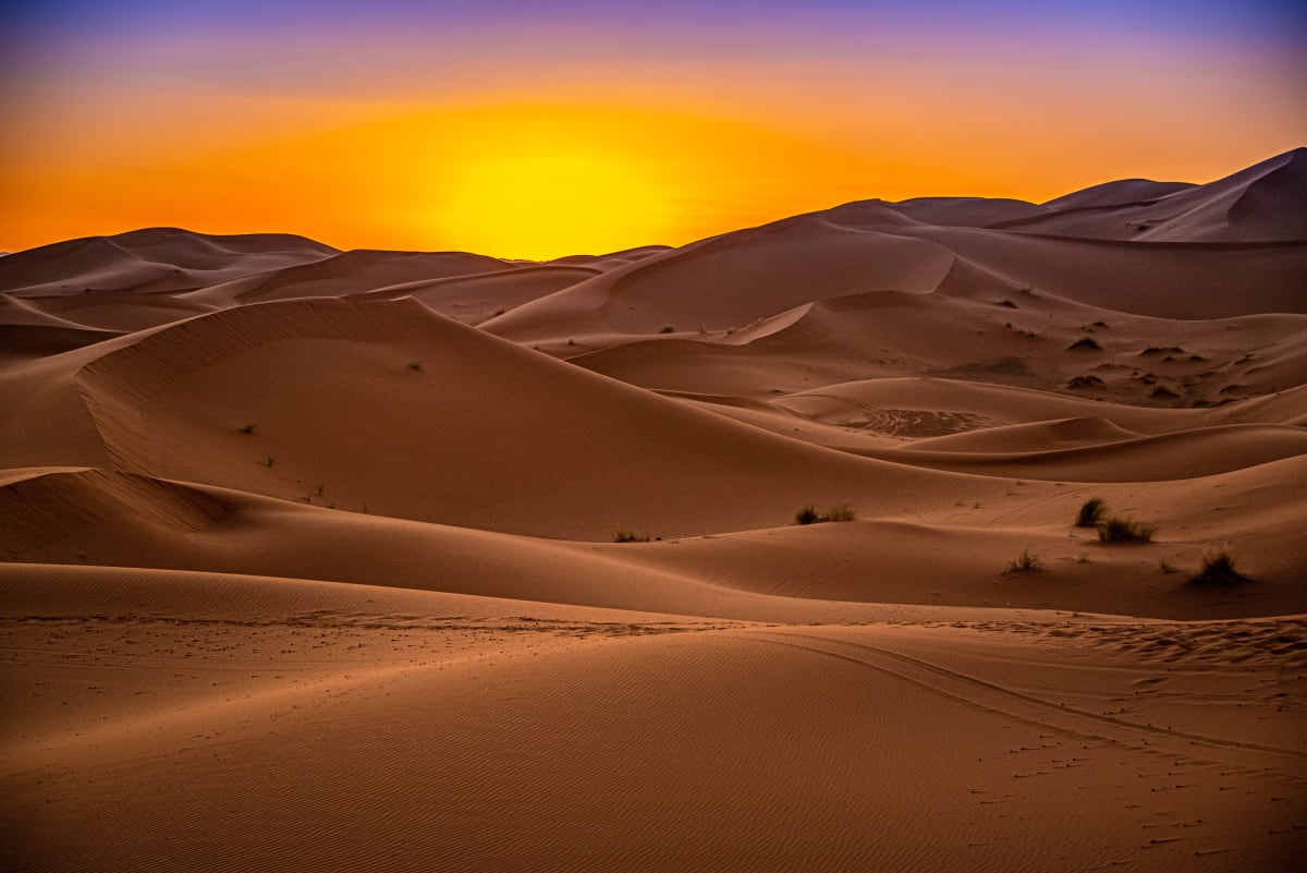 Sunset over Erg Chebbi dunes in Merzouga, Morocco desert landscape