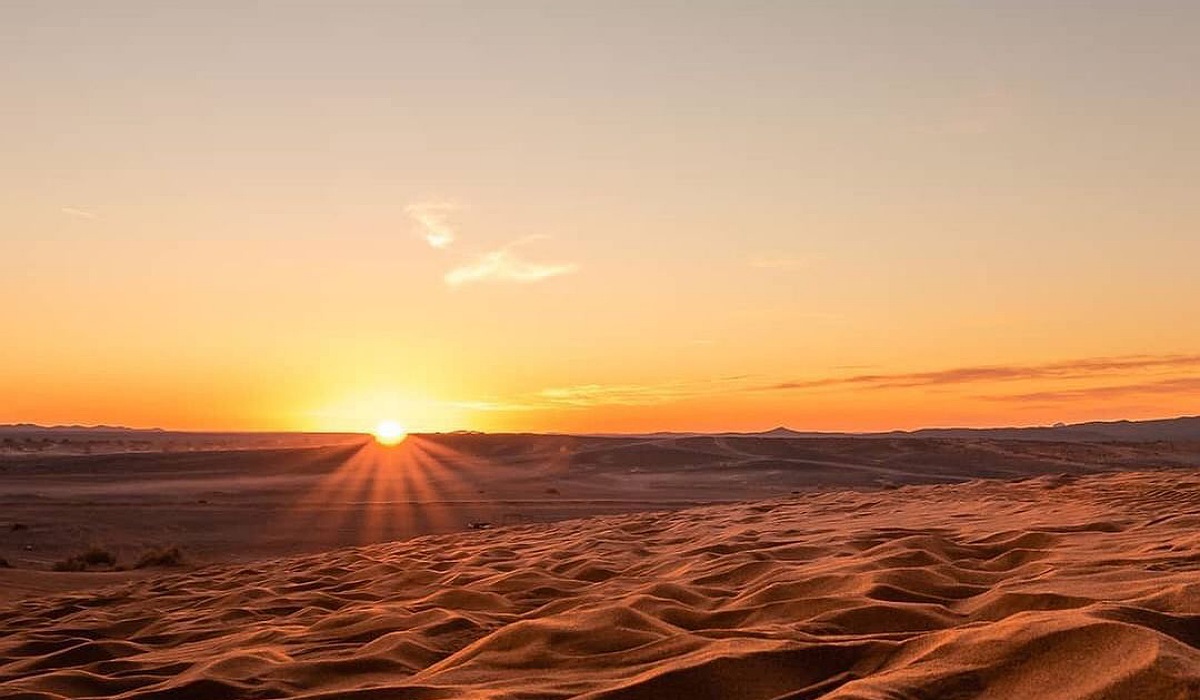 Sunset over the Sahara Desert during an overnight stay in Morocco